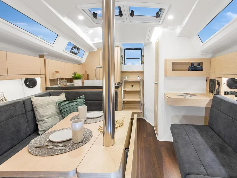 Slide: The Image of Modern interior of 2024 Hanse 348 sailboat with sleek design and cozy seating. - 10
