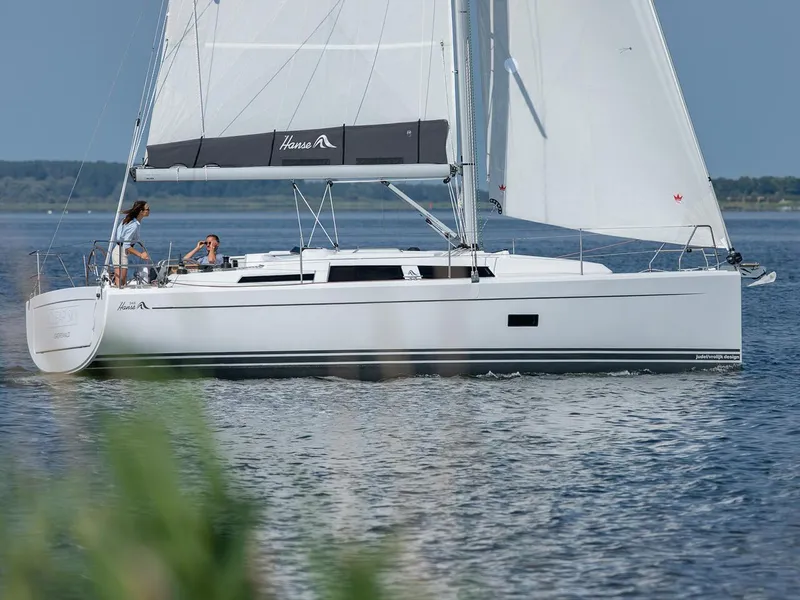 Slide: The Image of 2024 Hanse 348 sailboat cruising on calm waters. - 27