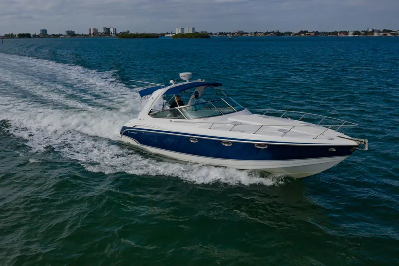 Slide: The Image of 2007 Formula 370 Super Sport cruising on open water, showcasing sleek design and performance. - 11