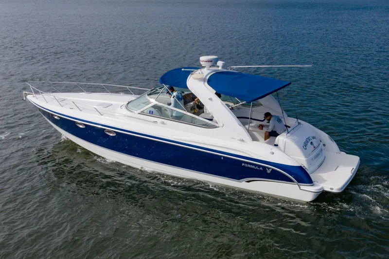 Slide: The Image of 2007 Formula 370 Super Sport boat cruising on open water. - 3