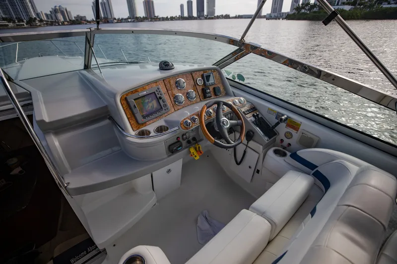 Slide: The Image of Interior of 2007 Formula 370 Super Sport boat with steering wheel and control panel. - 42