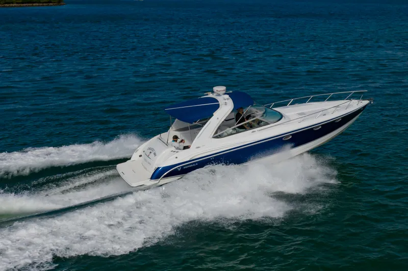 Slide: The Image of 2007 Formula 370 Super Sport boat cruising on open water. - 9