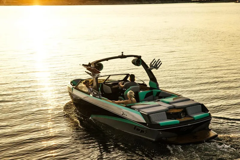 Slide: The Image of 2023 Tigé Z3 boat cruising on a lake at sunset. - 3