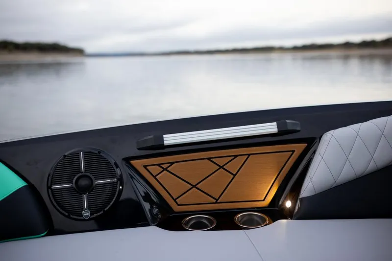Slide: The Image of 2023 Tigé Z3 boat interior detail with speaker and cup holders. - 5
