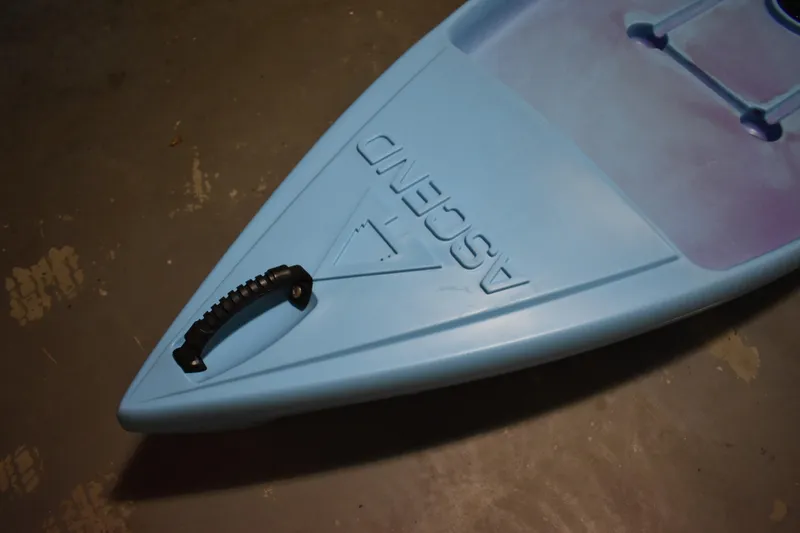 Slide: The Image of 2021 Ascend 9R Sport Sit-On kayak, blue with a black handle, top view. - 4