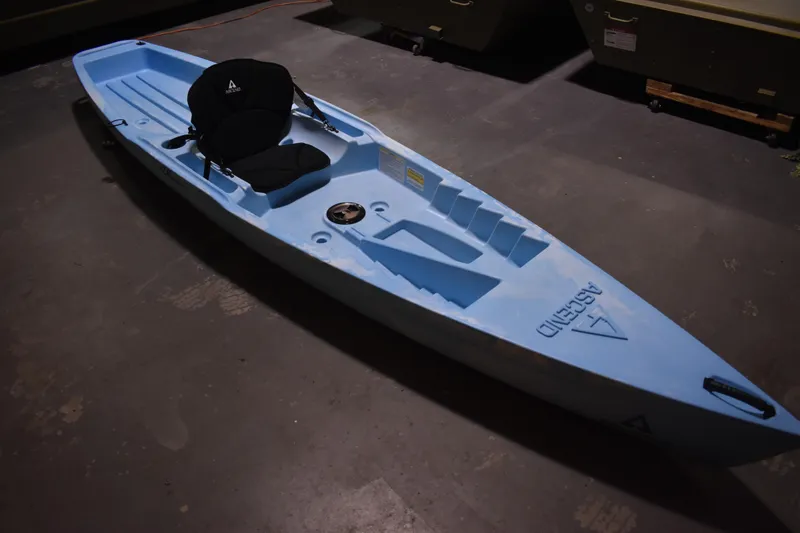 The Image of Blue Ascend 12R Sport Sit-On kayak, 2021 model, displayed indoors. - 5