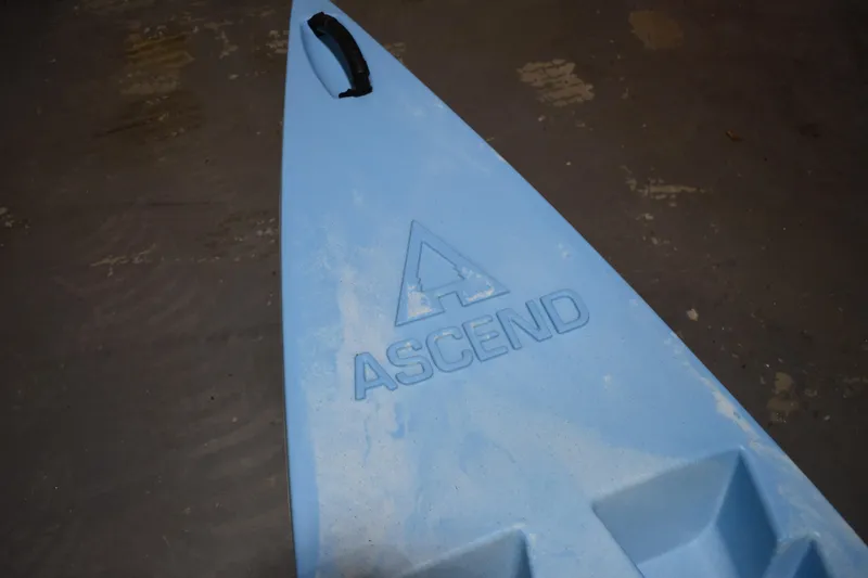Slide: The Image of Blue Ascend 12R Sport Sit-On kayak, 2021 model, with logo and handle. - 7