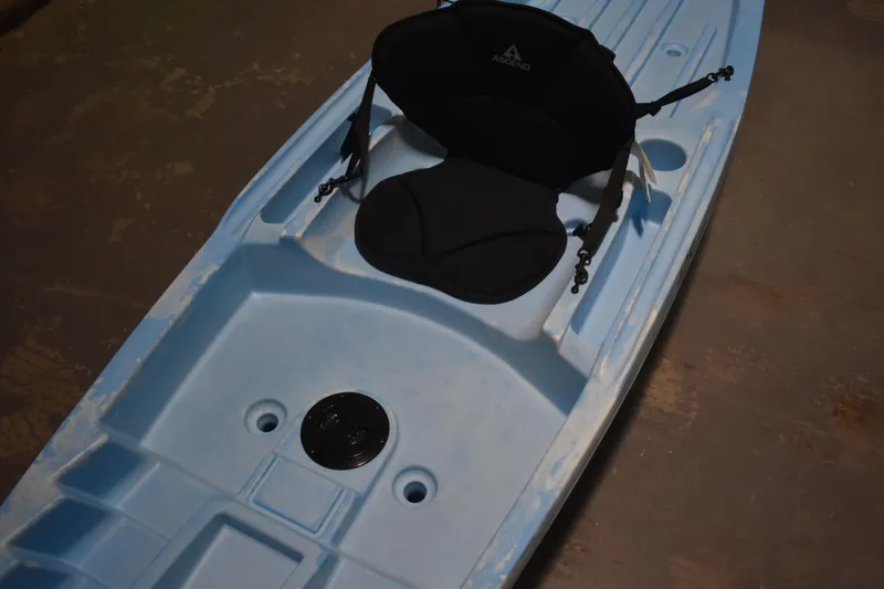 Slide: The Image of Blue Ascend 12R Sport Sit-On kayak, 2021 model, featuring a comfortable black seat. - 9