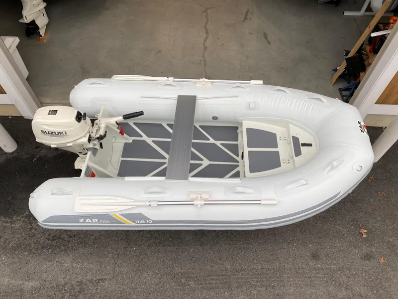 Slide: The Image of 2022 ZAR Mini Rib HDL10 inflatable boat with Suzuki outboard motor. - 3