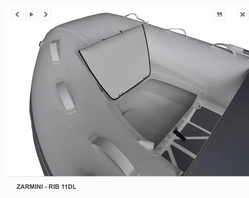 Slide: The Image of 2022 ZAR Mini 11 HDL inflatable boat interior with open storage compartment. - 4