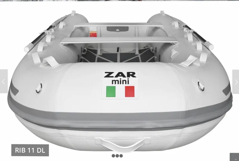 Slide: The Image of 2022 ZAR Mini 11 HDL inflatable boat, front view, white with Italian flag logo. - 6