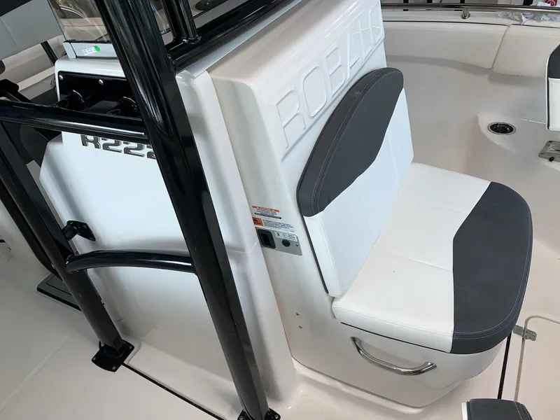 Slide: The Image of 2024 Robalo R222 boat interior seating and console. - 8