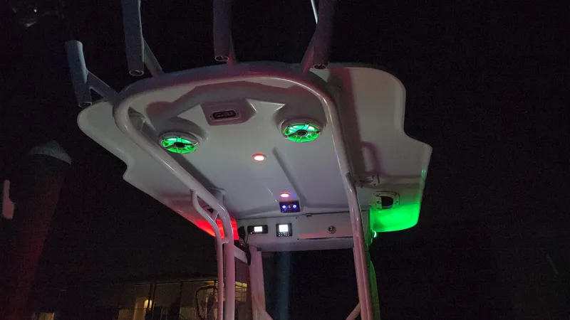 Slide: The Image of Everglades 243 CC 2006 boat with illuminated T-top at night. - 19