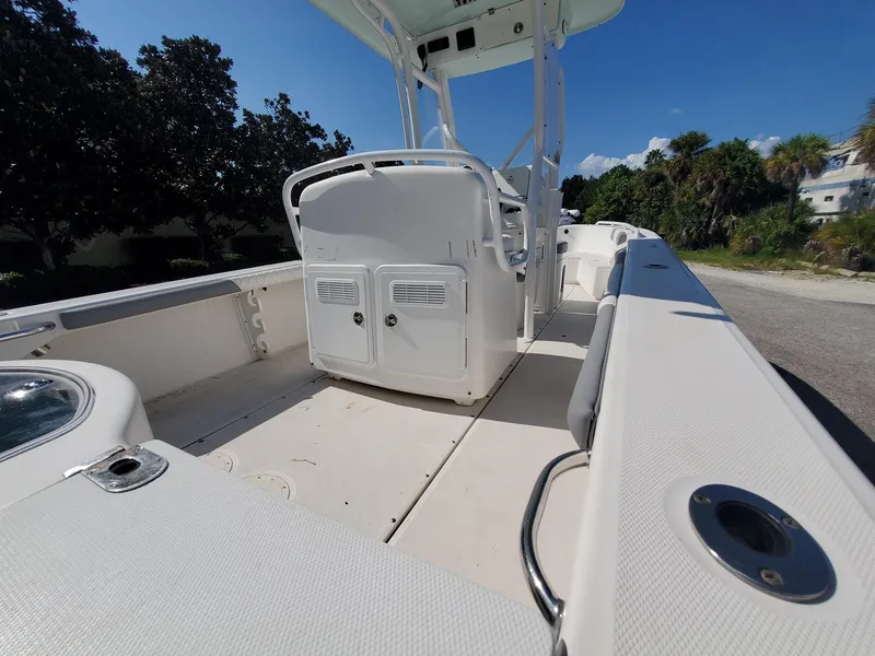 Slide: The Image of 2006 Everglades 243 CC boat interior with center console and seating. - 43