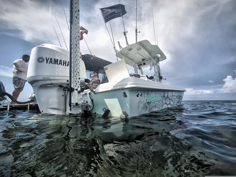 Slide: The Image of 2006 Everglades 243 CC boat with Yamaha engine on open water. - 47