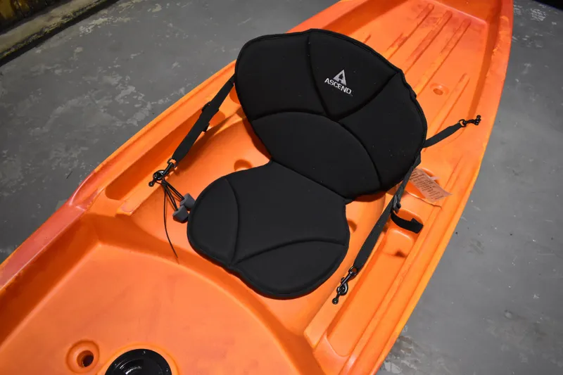 Slide: The Image of Orange Ascend 12R Sport Sit-On kayak with black padded seat, 2021 model. - 6