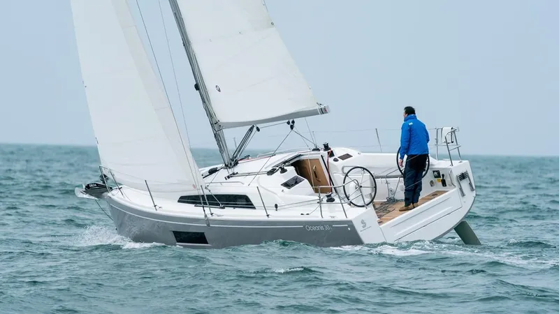 The Image of 2024 Beneteau Oceanis 30.1 sailing on open water. - 0