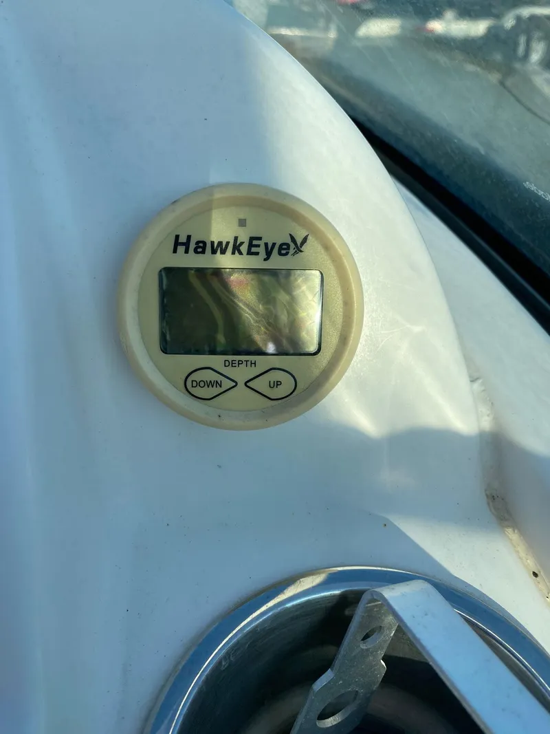 Slide: The Image of HawkEye depth gauge on 2016 Baja 23 Islander boat dashboard. - 12