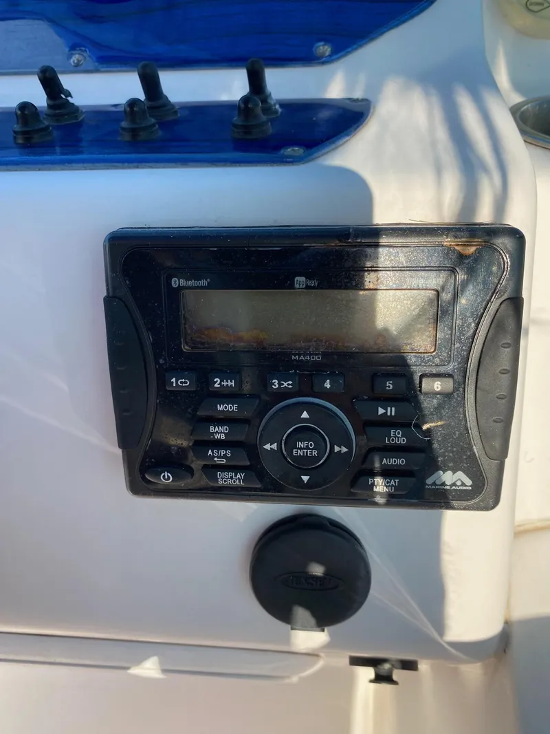 Slide: The Image of Boat stereo system on a 2016 Baja 23 Islander. - 14