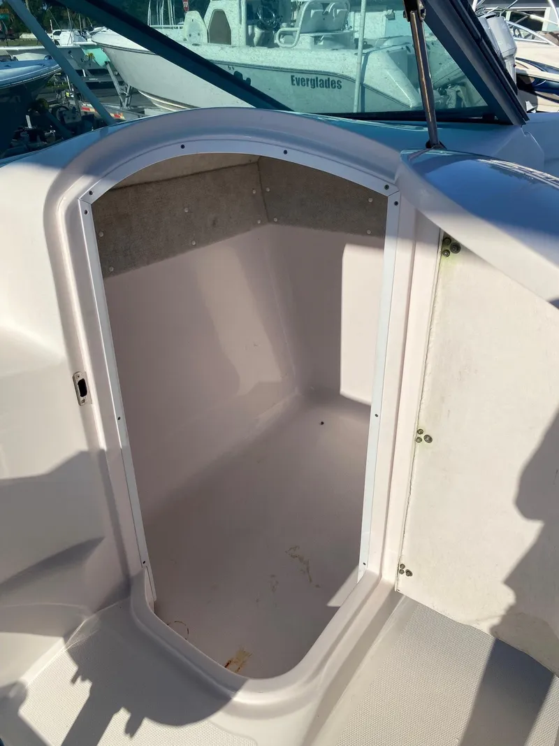 Slide: The Image of 2016 Baja 23 Islander boat cabin entrance with open door. - 20