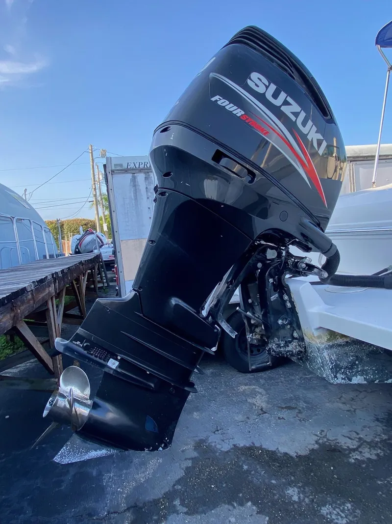 Slide: The Image of 2016 Baja 23 Islander with Suzuki outboard motor. - 27