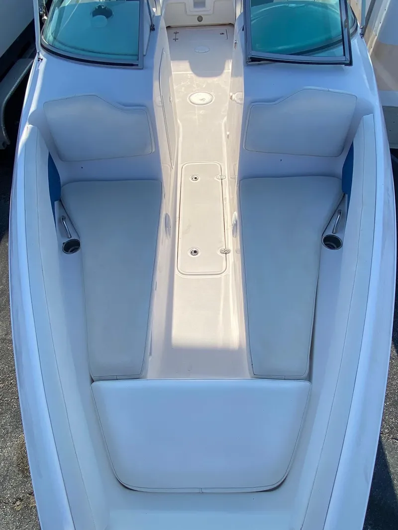 Slide: The Image of 2016 Baja 23 Islander boat interior with white seating and open bow. - 7