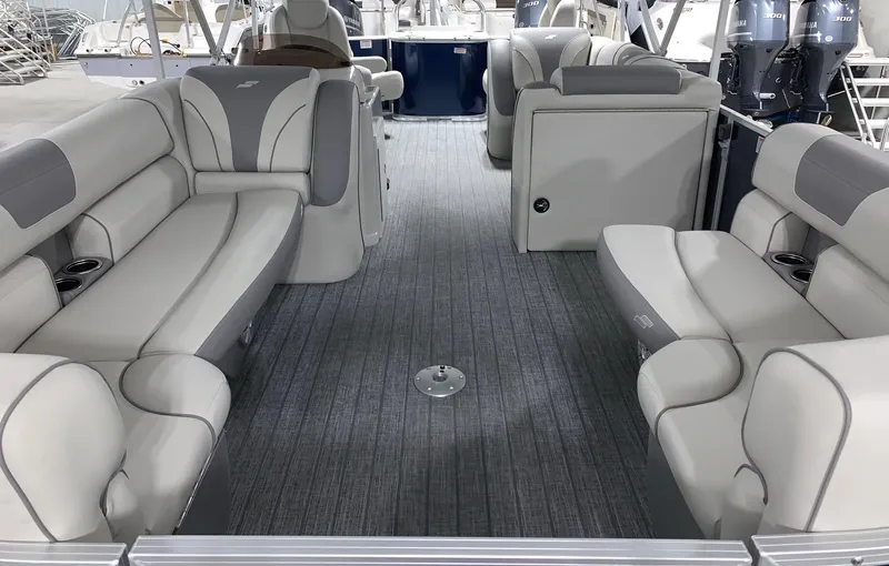 Slide: The Image of 2024 Starcraft EX22 FD pontoon boat interior with luxurious seating and modern design. - 4