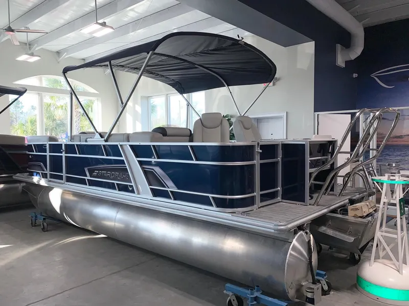 The Image of 2024 Starcraft EX22 FD pontoon boat in showroom. - 0
