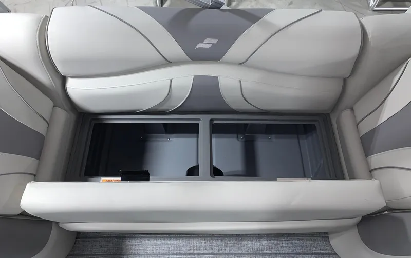 Slide: The Image of 2024 Starcraft EX22 FD boat seat storage compartment. - 7