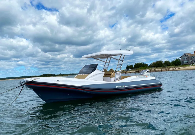 The Image of 2020 Zar Formenti 85 SL boat on calm water under cloudy sky. - 0
