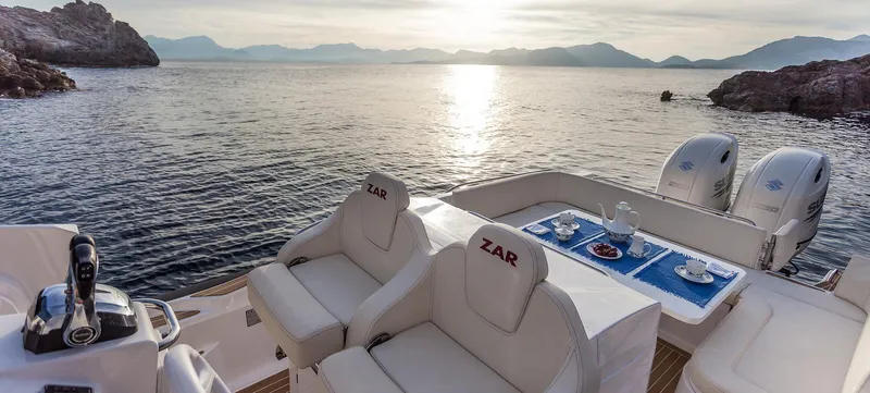 Slide: The Image of 2020 Zar Formenti 85 SL boat interior with ocean view at sunset. - 10