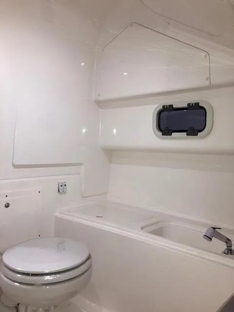 Slide: The Image of 2020 Zar Formenti 85 SL boat bathroom with toilet and sink. - 17