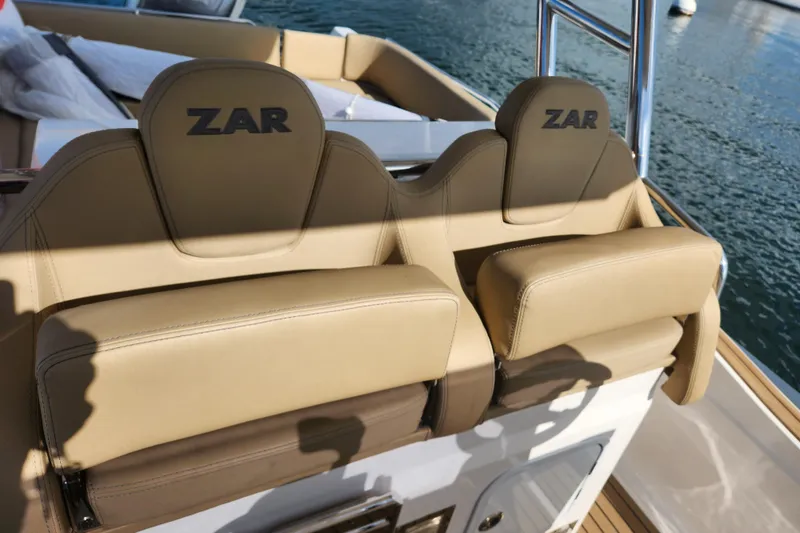 Slide: The Image of Luxury seating on 2020 Zar Formenti 85 SL boat, featuring beige upholstery. - 21