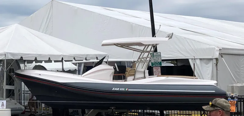 Slide: The Image of 2020 Zar Formenti 85 SL boat displayed at a marine exhibition. - 4