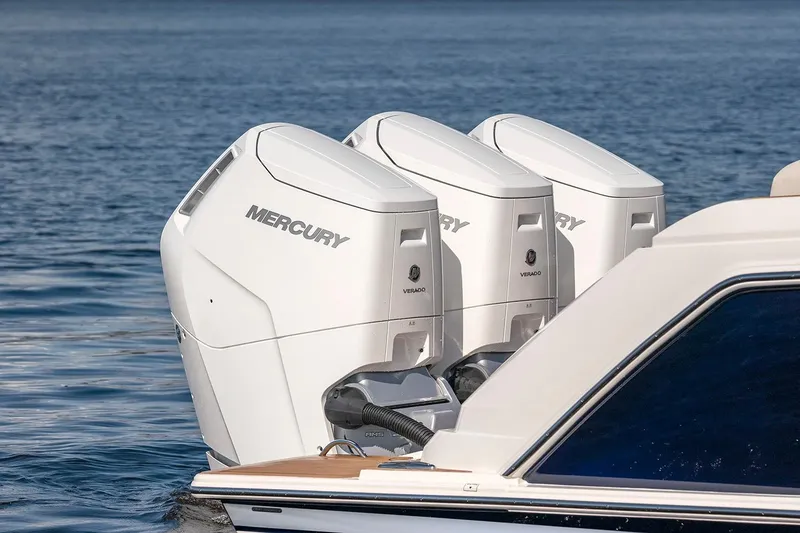 Slide: The Image of 2025 Tiara Yachts 48 LS with triple Mercury outboard engines. - 4