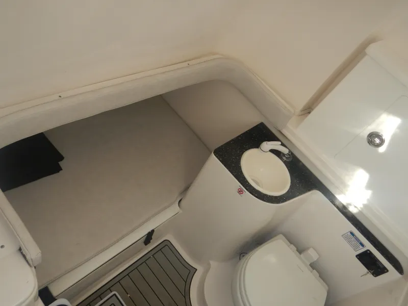 Slide: The Image of 2024 Sea Fox 328 Commander boat interior with sink and toilet. - 18