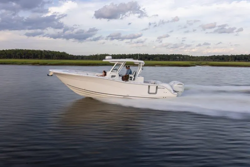 Slide: The Image of 2024 Sea Fox 328 Commander cruising on a calm river. - 24