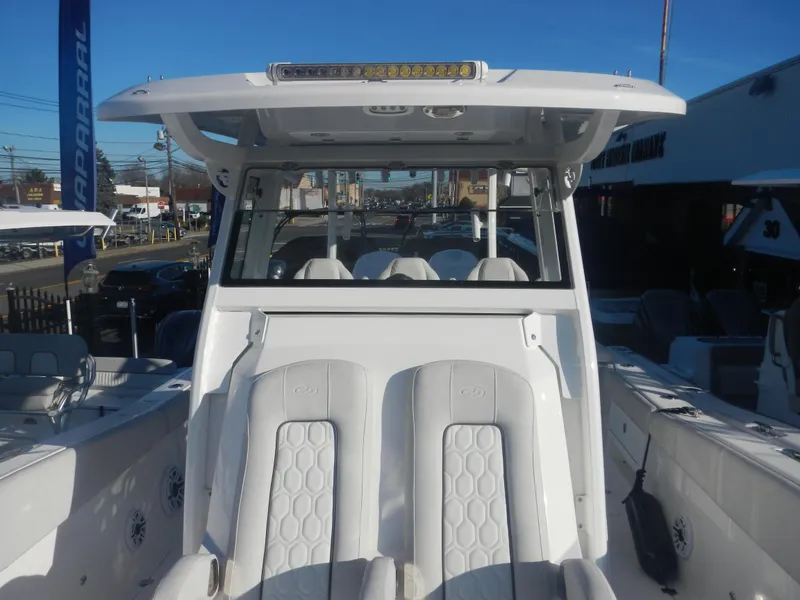 Slide: The Image of 2024 Sea Fox 328 Commander boat with dual seating and modern helm station. - 8