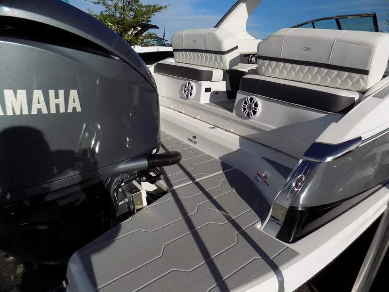 Slide: The Image of 2023 Regal 29 OBX boat with Yamaha engine, featuring sleek seating and modern design. - 3