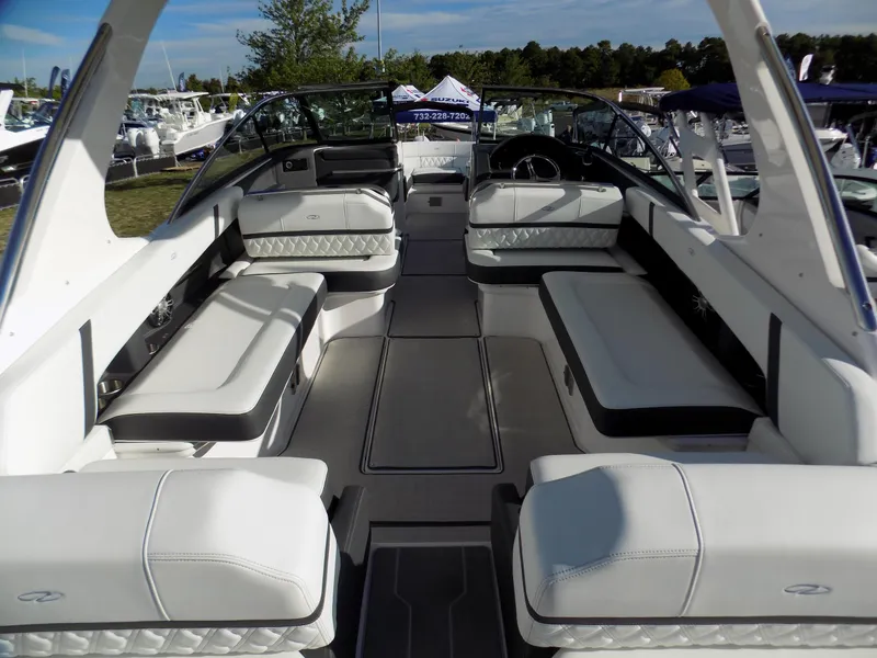 Slide: The Image of 2023 Regal 29 OBX boat interior with spacious seating and modern design. - 4