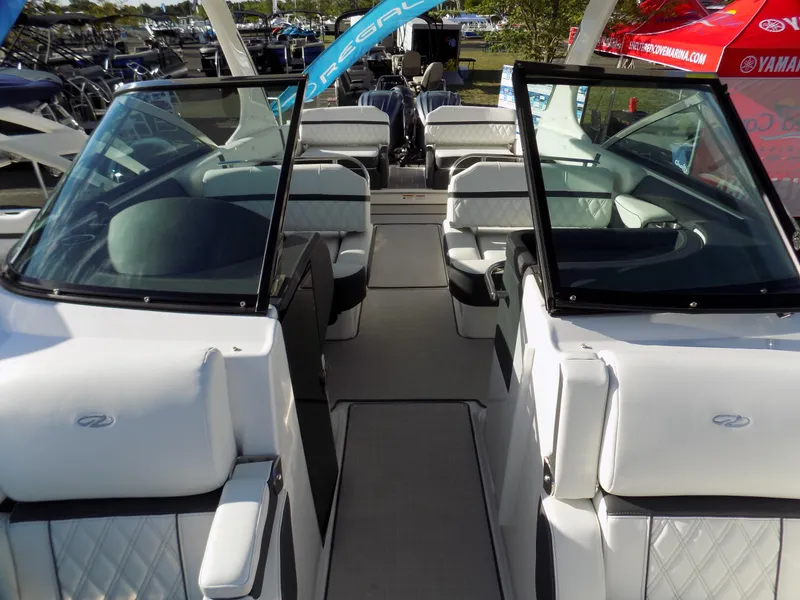 Slide: The Image of 2023 Regal 29 OBX boat interior with sleek seating and modern design. - 6