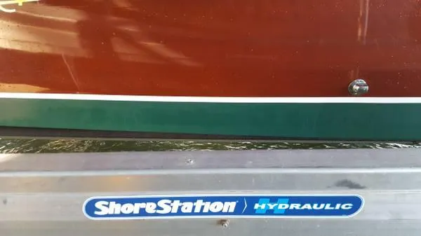 Slide: The Image of 1989 Hacker-Craft Triple Cockpit on ShoreStation hydraulic lift. - 12