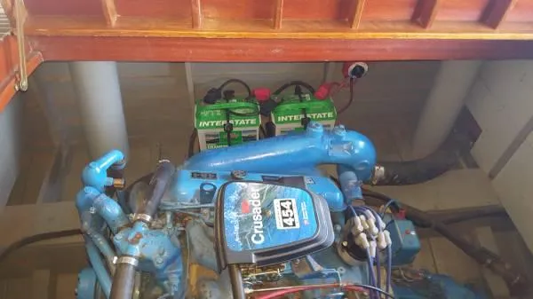 Slide: The Image of Engine compartment of 1989 Hacker-Craft Triple Cockpit with Crusader 454 engine and Interstate batteries. - 14