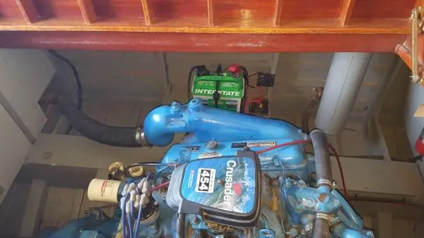 Slide: The Image of Engine compartment of a 1989 Hacker-Craft Triple Cockpit boat with Crusader 454 engine. - 17