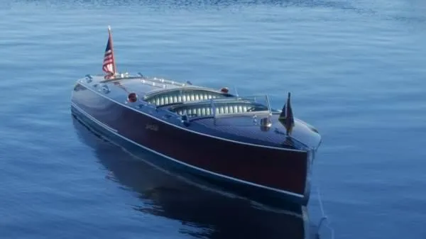 Slide: The Image of 1989 Hacker-Craft Triple Cockpit boat on calm water, featuring classic wooden design. - 3