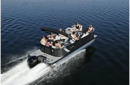 Slide: The Image of 2021 SunChaser Geneva Sport 22 LR DH pontoon boat cruising on a lake. - 13