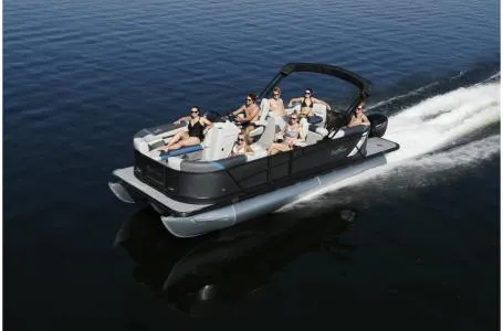 Slide: The Image of 2021 SunChaser Geneva Sport 22 LR DH pontoon boat cruising on water. - 23