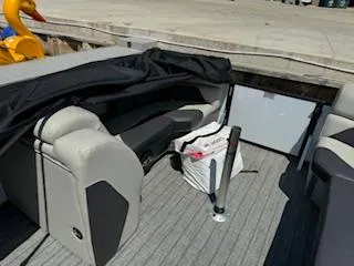 Slide: The Image of Interior of 2021 SunChaser Geneva Sport 22 LR DH pontoon boat with seating and storage. - 8