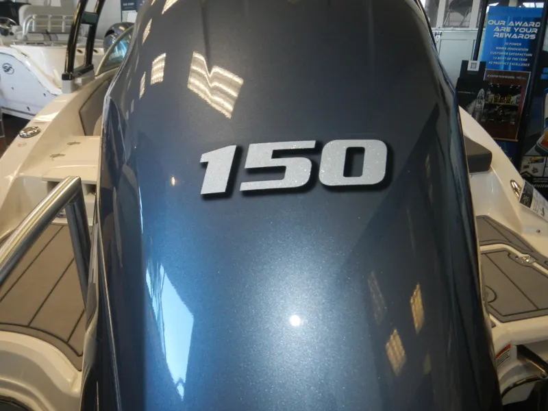 Slide: The Image of 2024 Chaparral 21 SSi boat with 150 horsepower engine. - 7