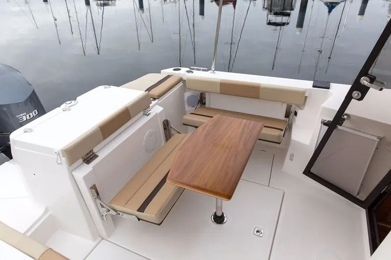 Slide: The Image of 2021 Ranger Tugs R-27 LE - Cockpit dining - 11